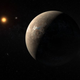 An artist's impression of Proxima b orbiting the red dwarf star Proxima Centaur (Image: M. Kornmesser/AFP/Getty Images)